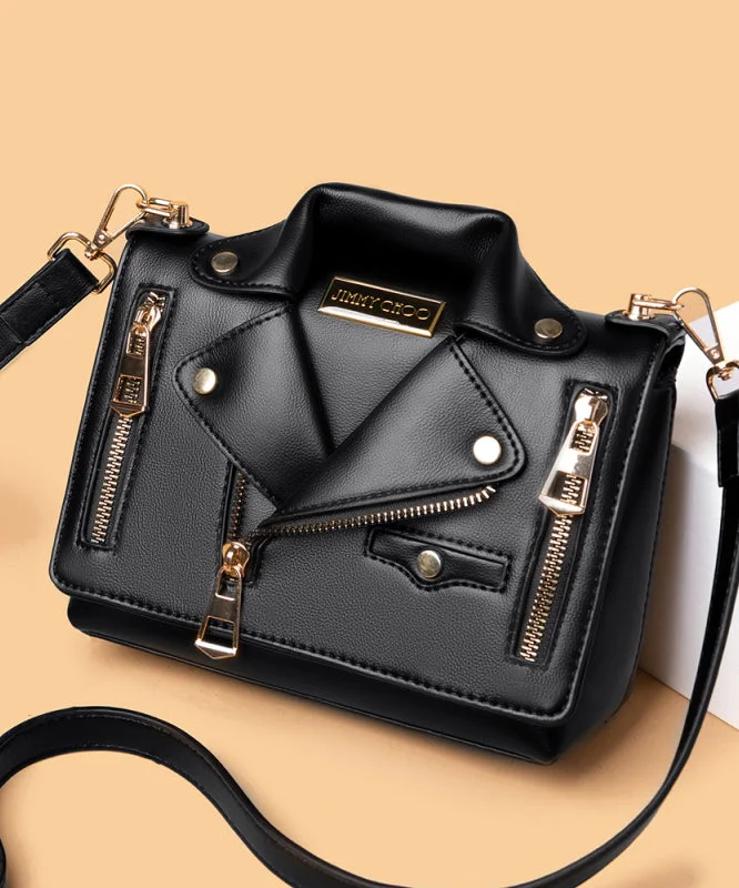 Fashionable black zipper crossbody bag made of faux leather.
