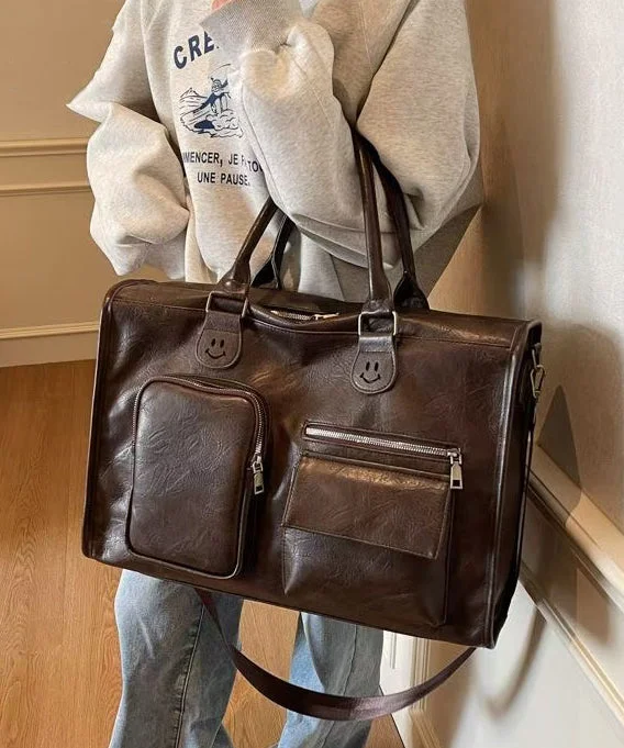 Brown faux leather handbag with a smiley face decoration, large capacity, handmade.